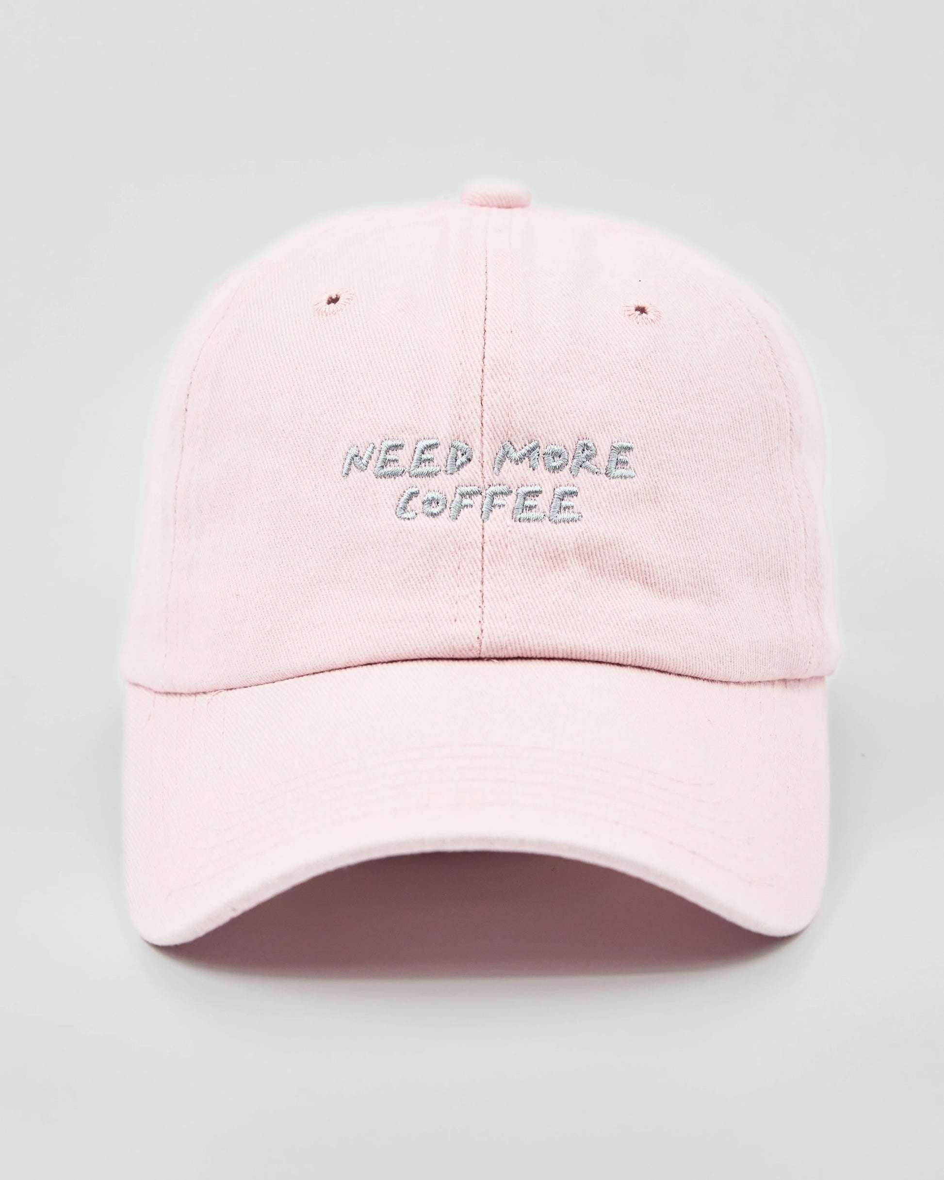 Front view of Need More Coffee Light Pink Washed Cap
