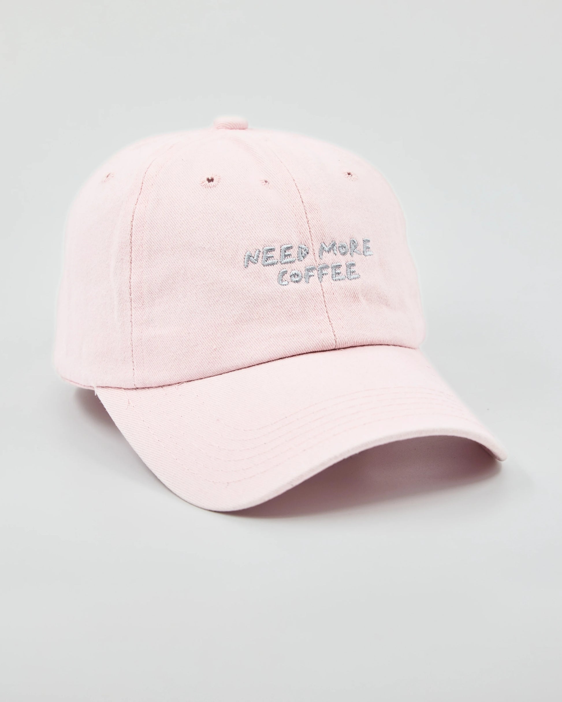 Side view of Need More Coffee Light Pink Washed Cap