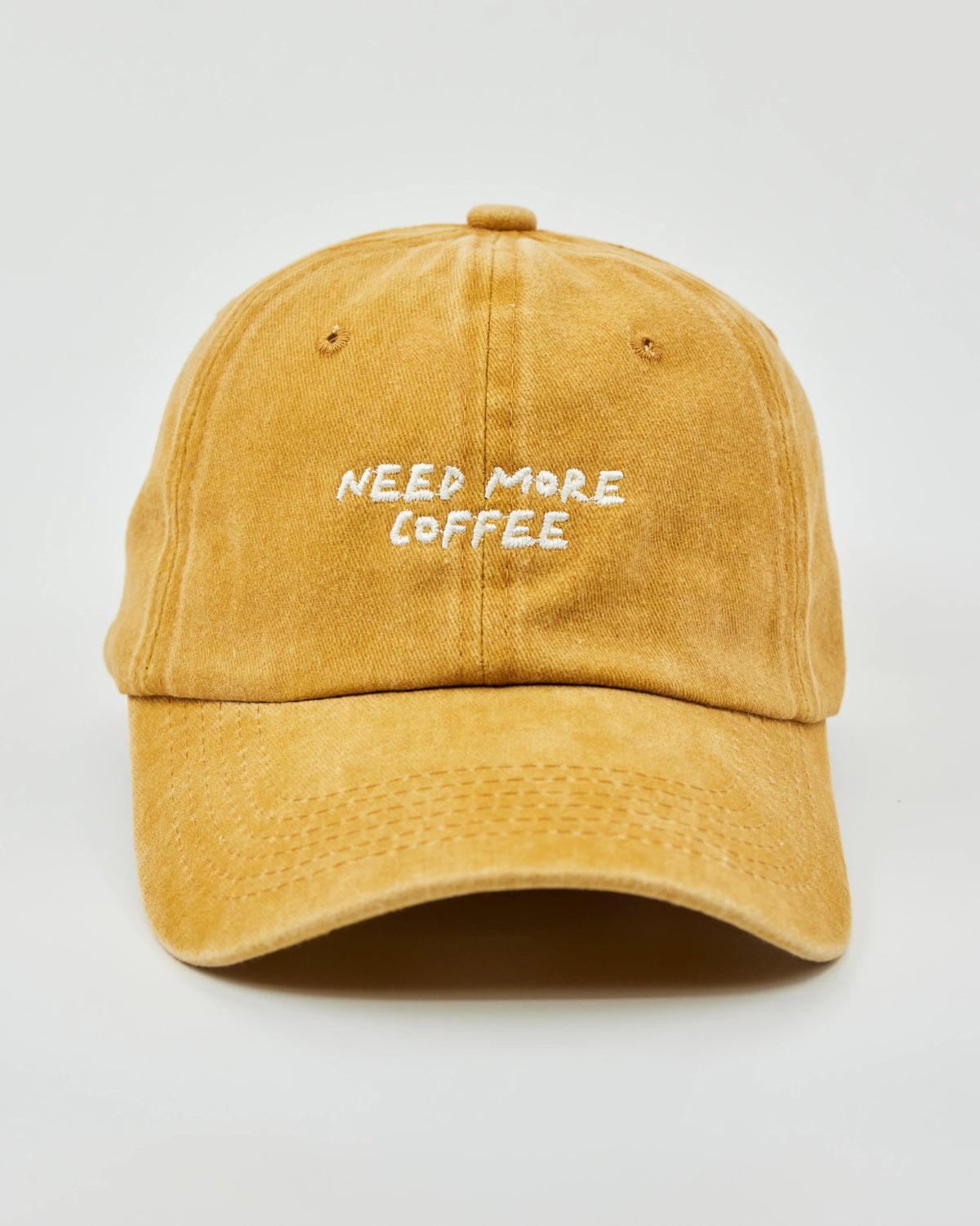 Front view of Need More Coffee Mustard Washed Cap
