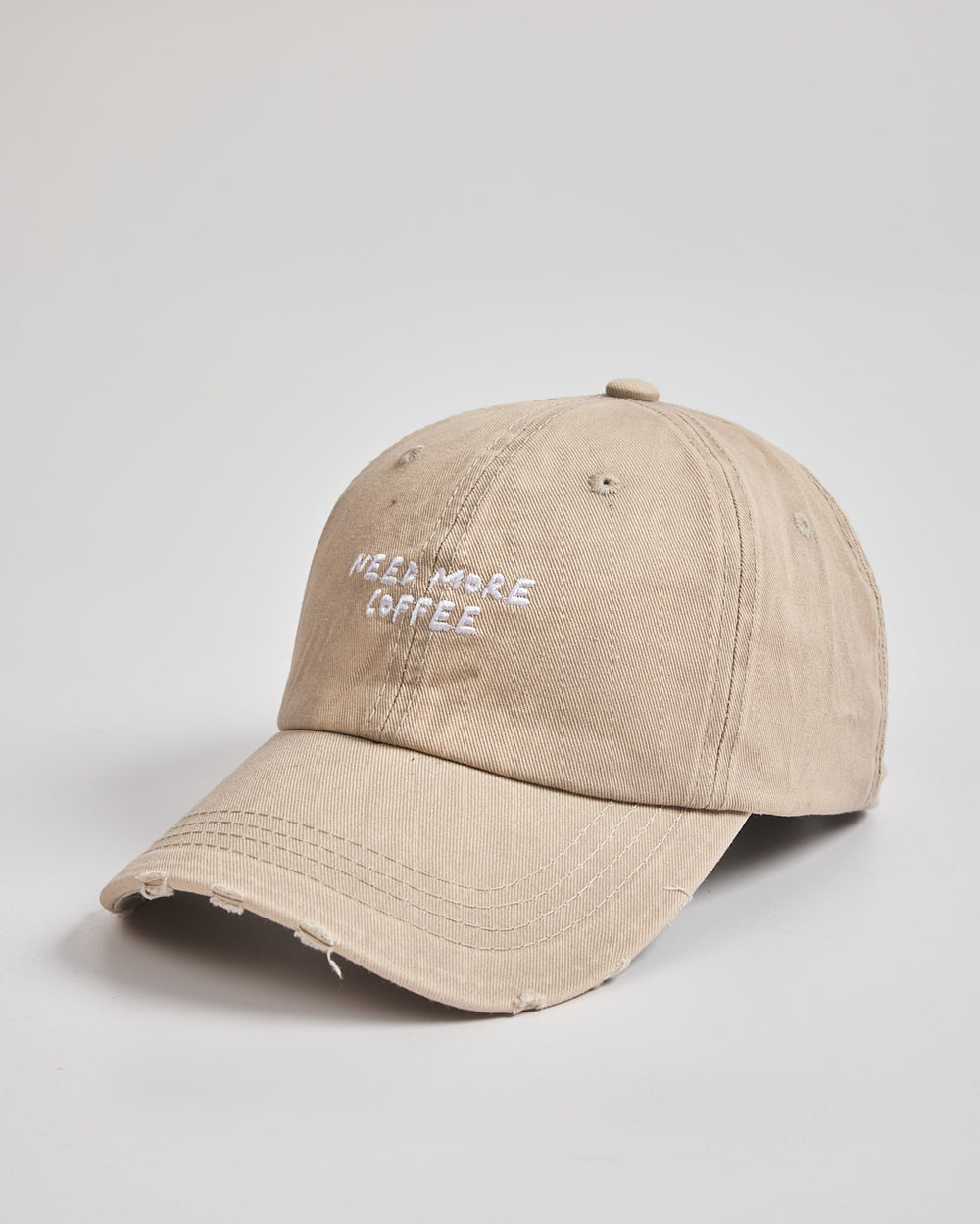 Side view of Need More Coffee Oat Washed Cap