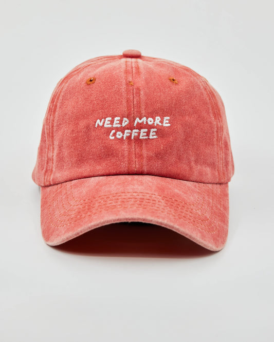 Front view of Need More Coffee Orange Washed Cap