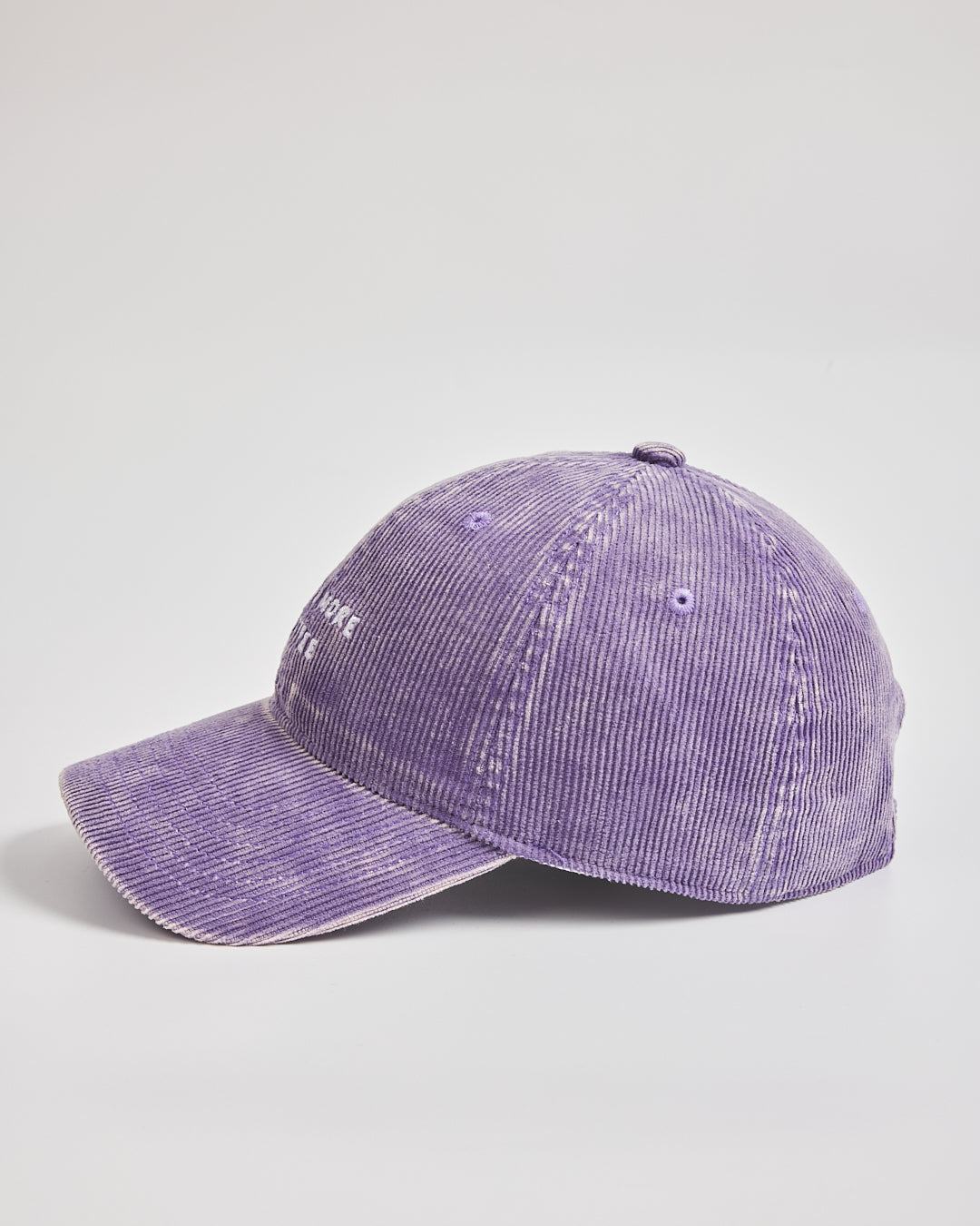 Purple baseball cap on a light gray background