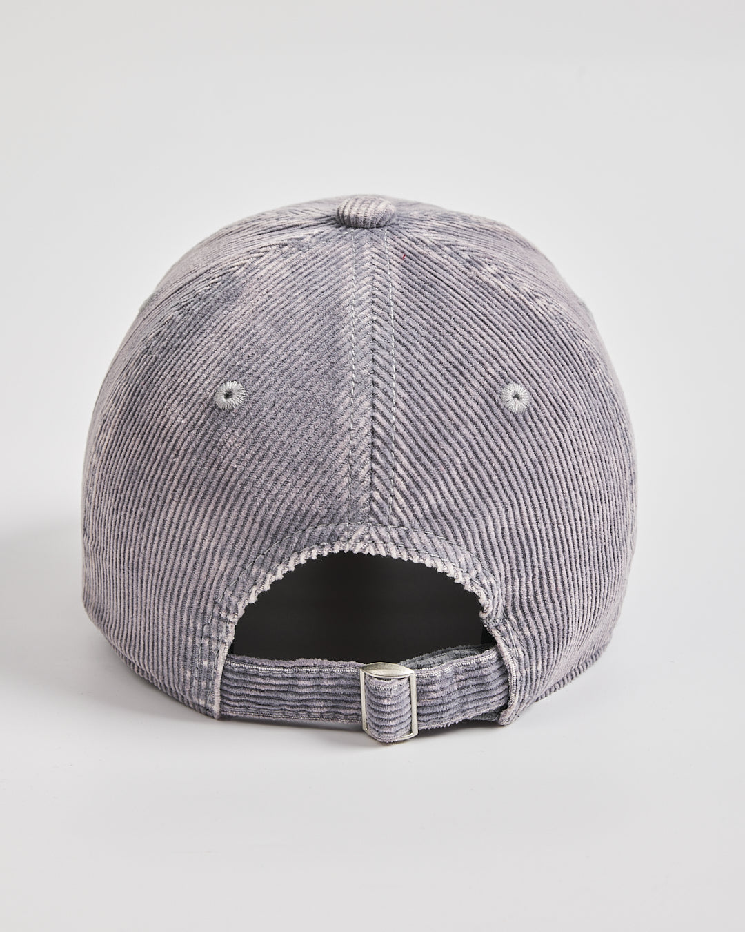 Gray corduroy cap on a light gray background