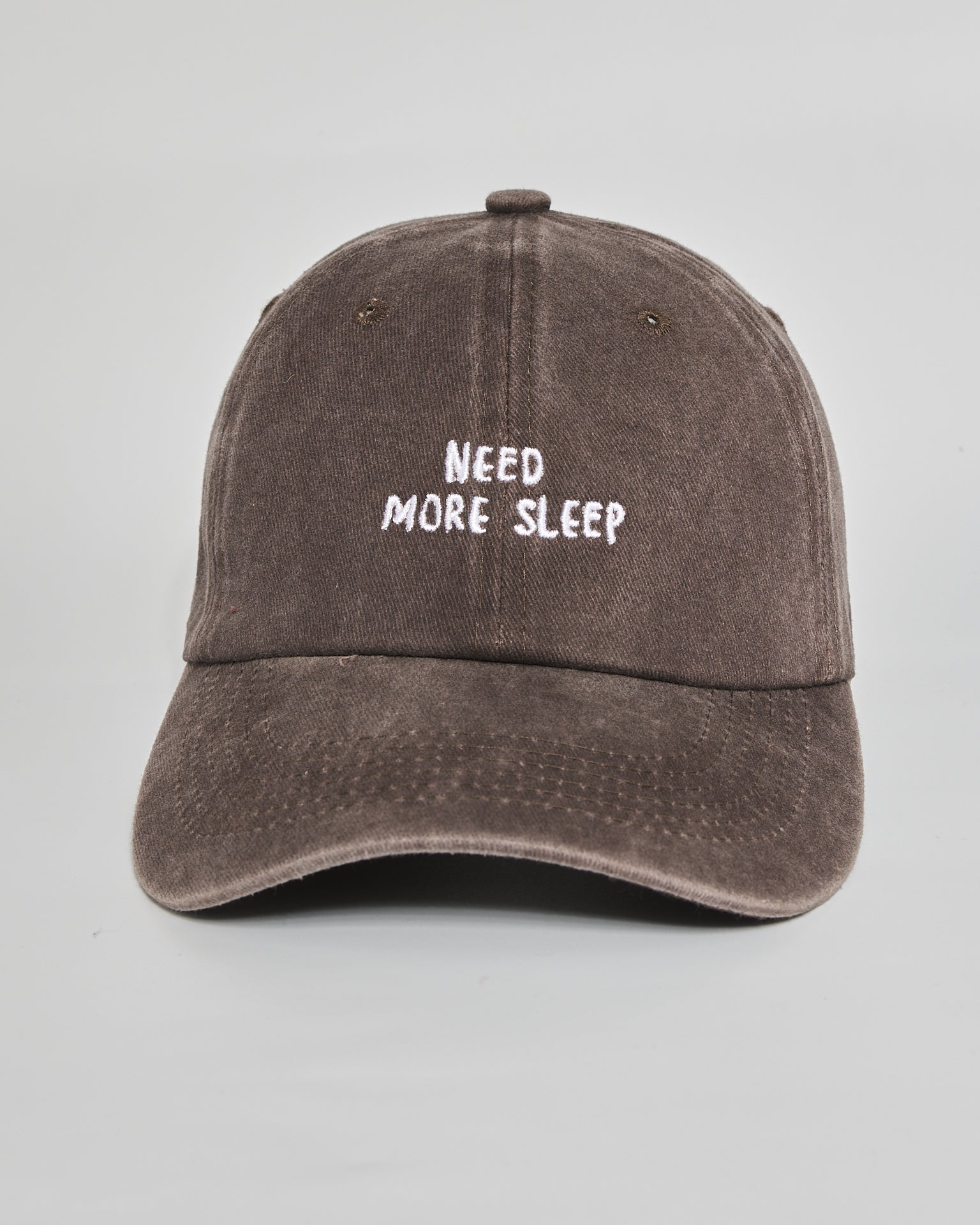 Need More Sleep brown washed cap - front view