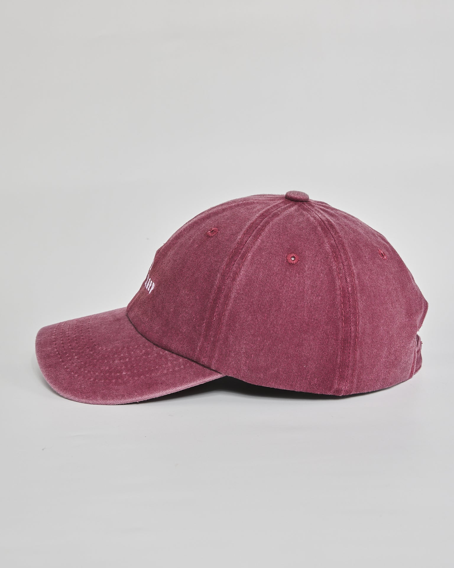 Need More Sleep burgundy washed cap - angled view