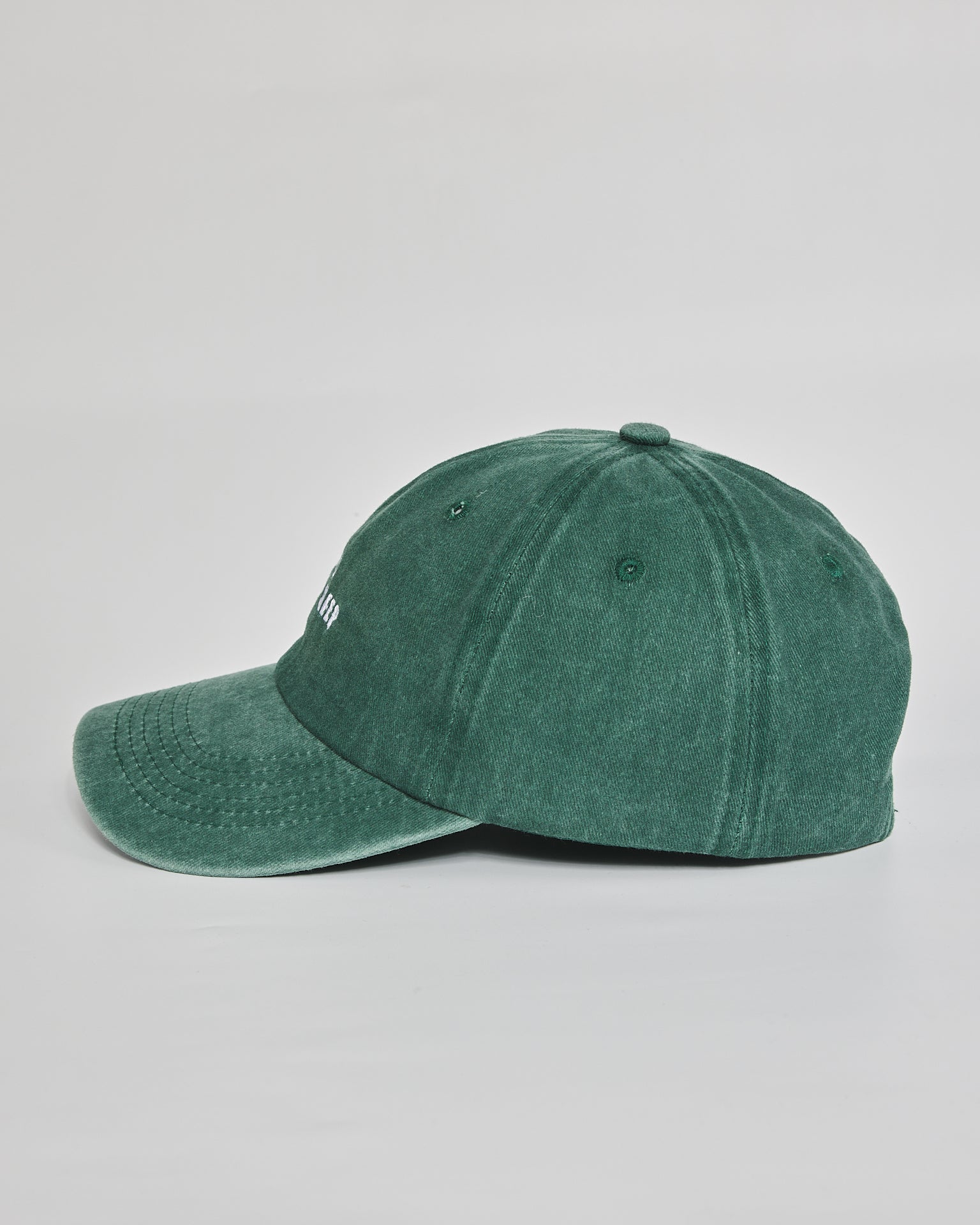Need More Sleep forest green washed cap - angled view