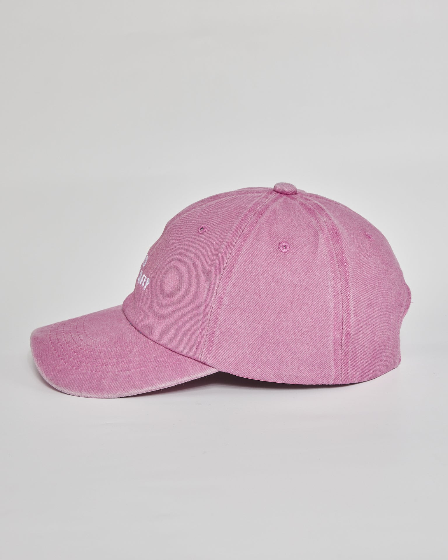 Need More Sleep pink washed cap - angled view