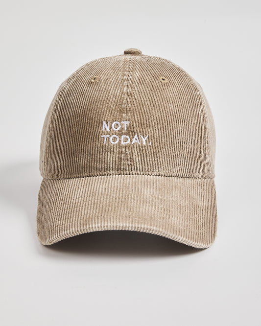 Beige cap with 'Not Today' text on a light gray background