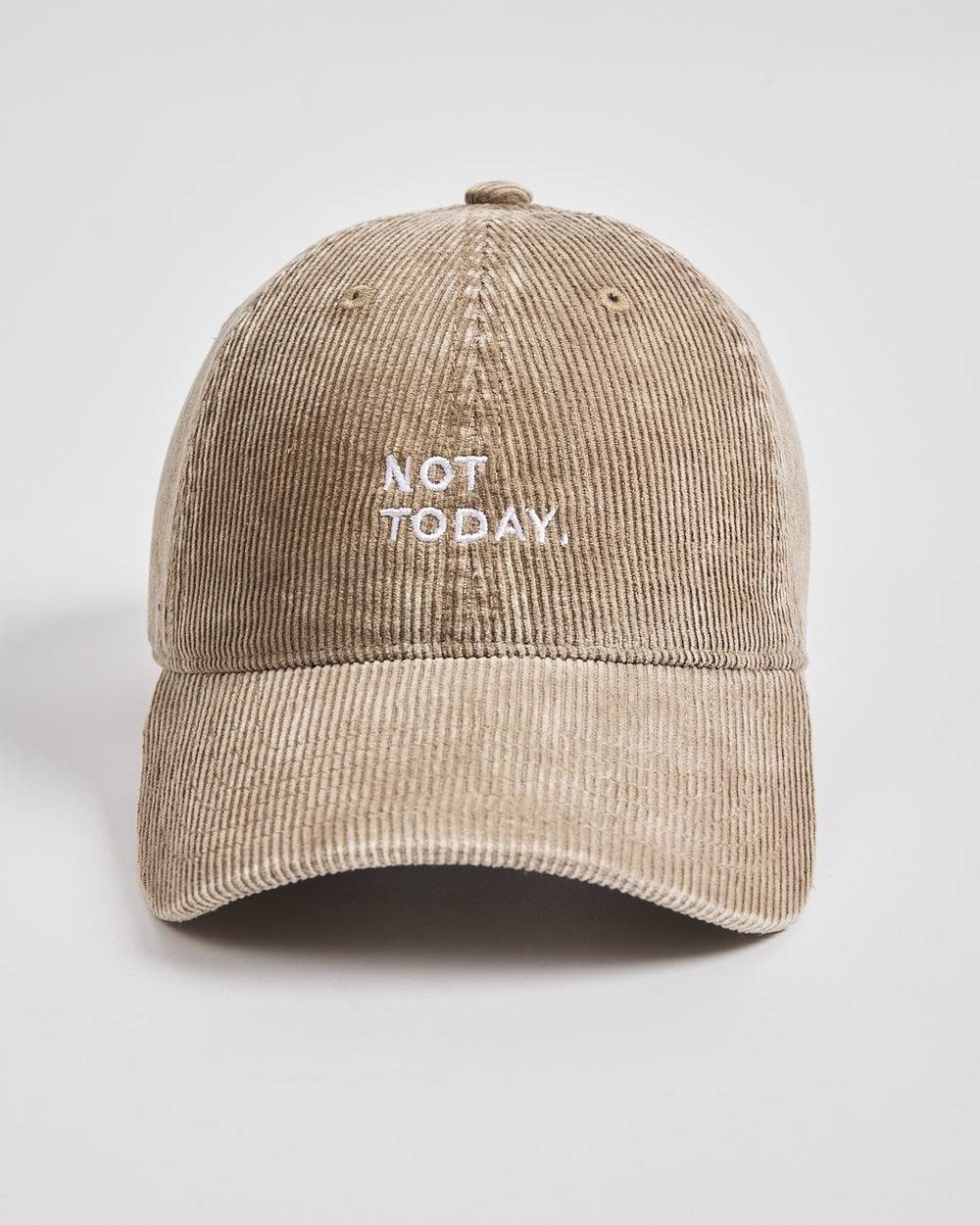 Beige cap with 'Not Today' text on a light gray background