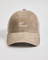 Beige cap with 'Not Today' text on a light gray background