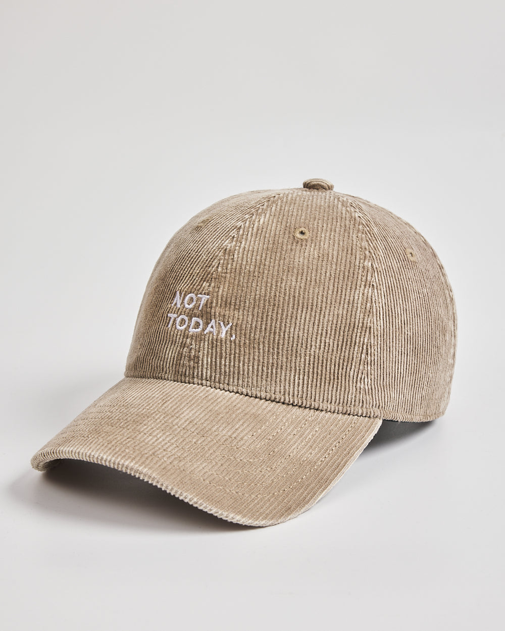 Beige cap with 'Not Today' text on a light gray background