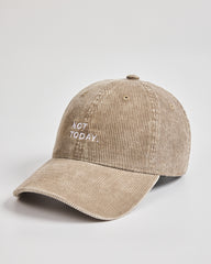 Beige cap with 'Not Today' text on a light gray background