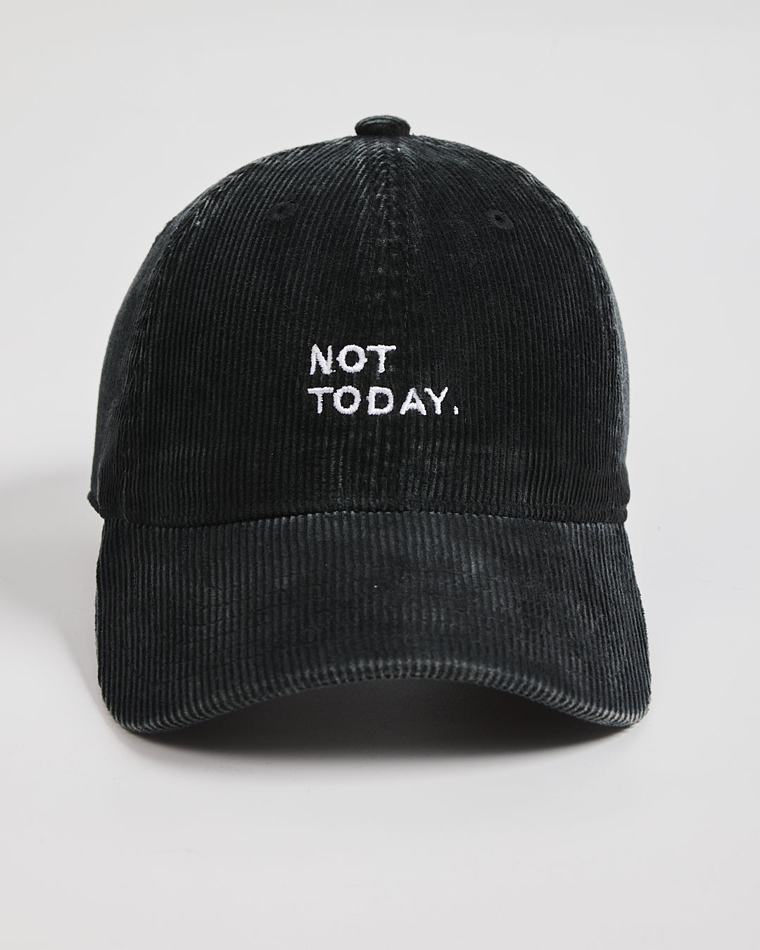 Black corduroy cap with 'Not Today' text on a white background