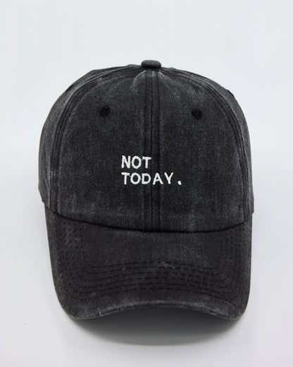 A black washed cap with the text 'NOT TODAY,' embroidered on the front.