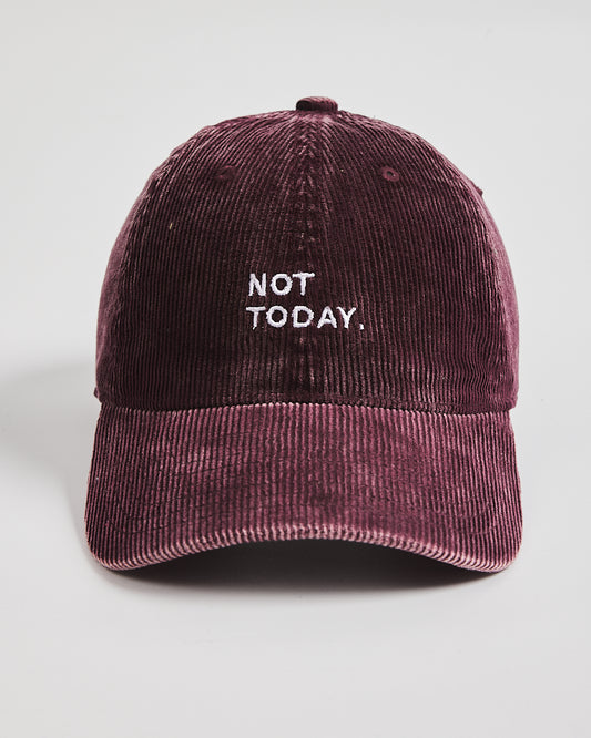 Maroon corduroy cap with 'Not Today' text on a light gray background