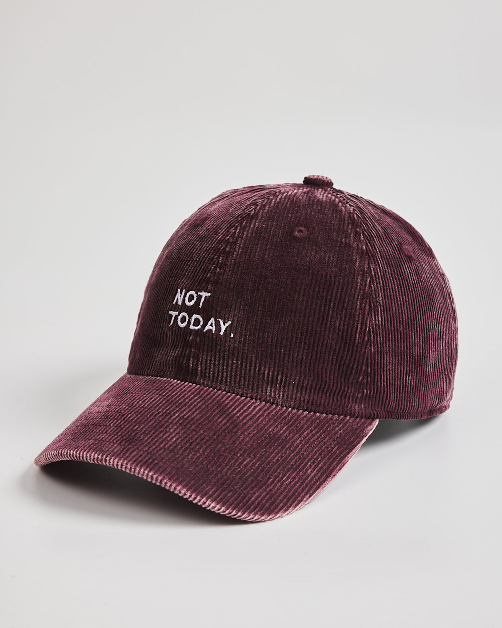 Maroon cap with 'Not Today' text on a light gray background