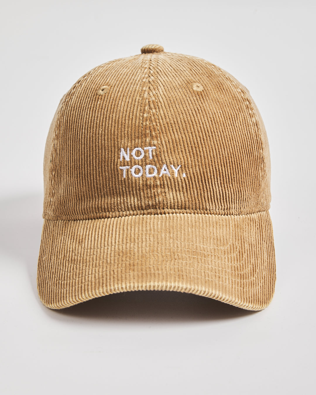 Camel corduroy cap with 'Not Today' text on a light gray background