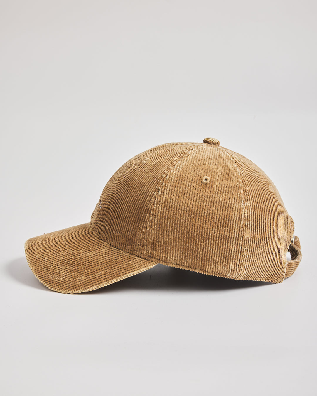 Camel corduroy cap on a light gray background