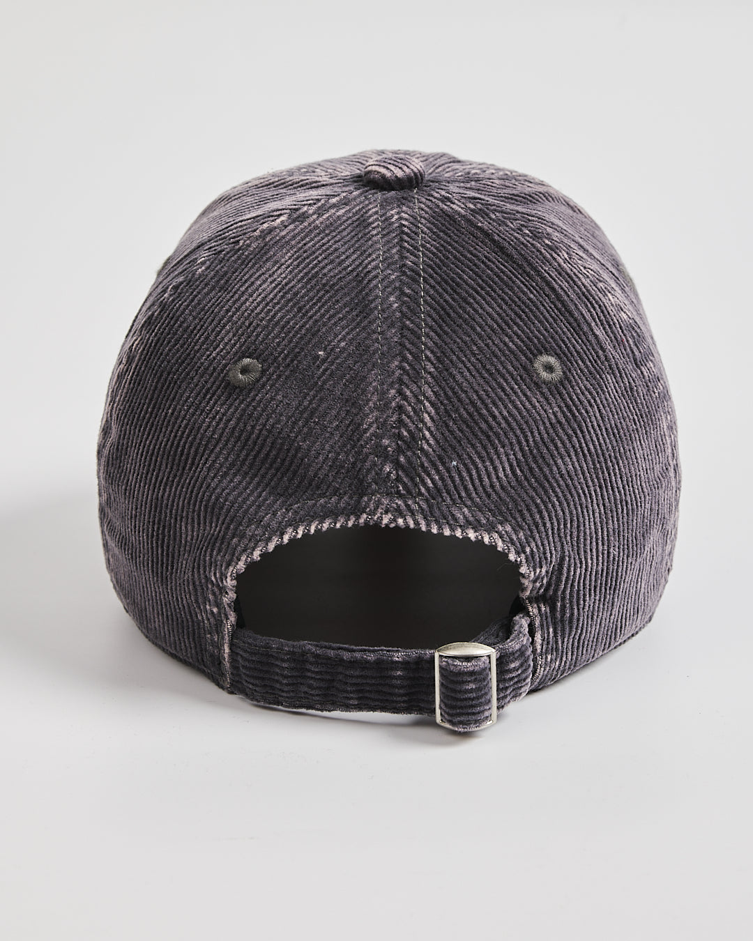 Black distressed baseball cap on a light gray background