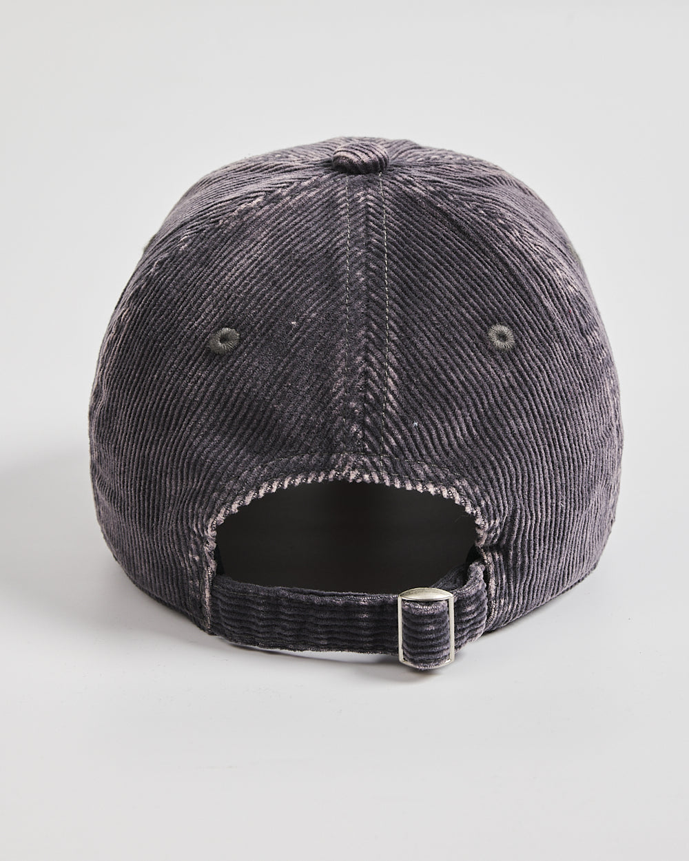 Black distressed baseball cap on a light gray background