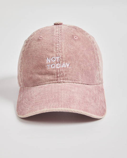 Pink cap with 'NOT TODAY' text on a light gray background