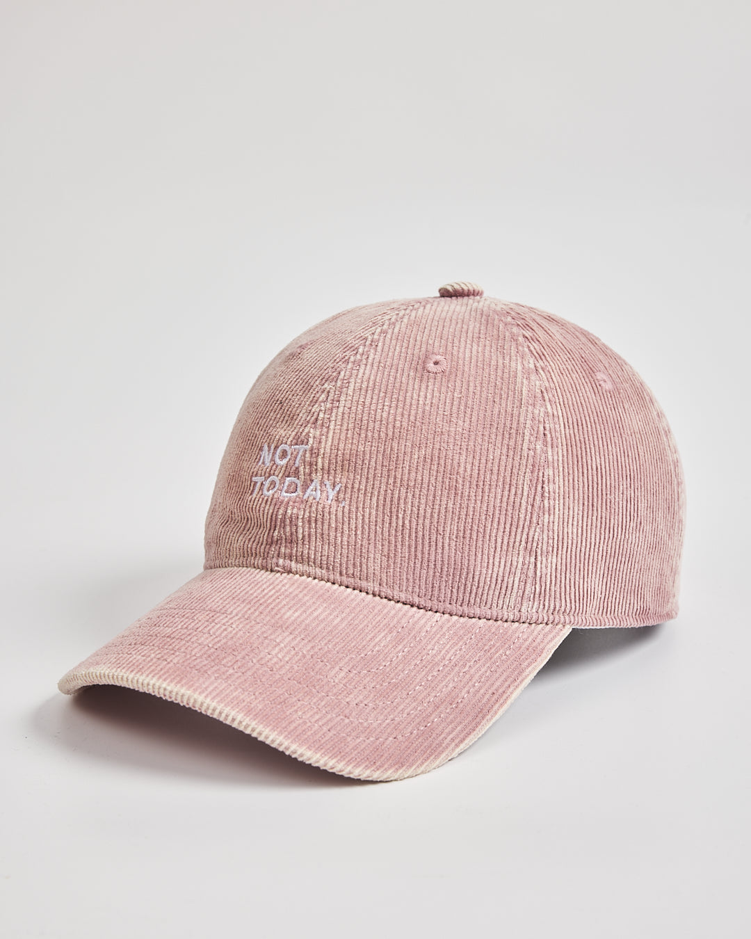 Pink cap with 'Not Today' text on a light gray background