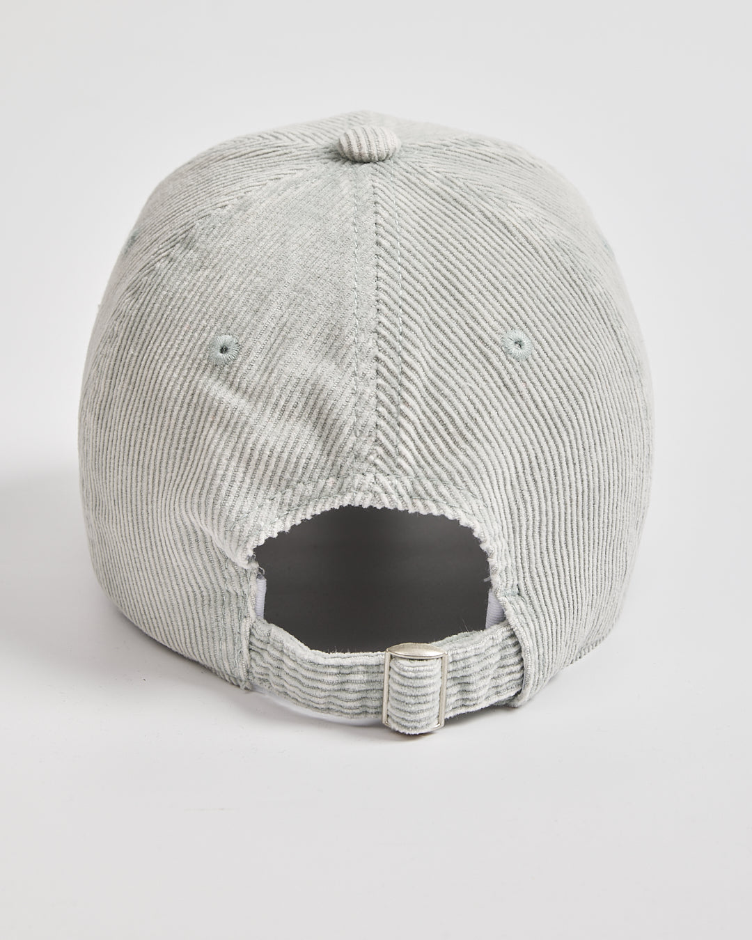 Gray corduroy cap on a white background