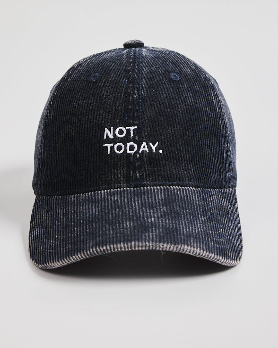 Navy corduroy cap with 'NOT TODAY.' text on a white background