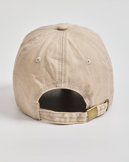 Beige baseball cap on a light gray background
