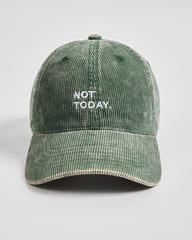 Green corduroy cap with 'Not Today' text on a light gray background