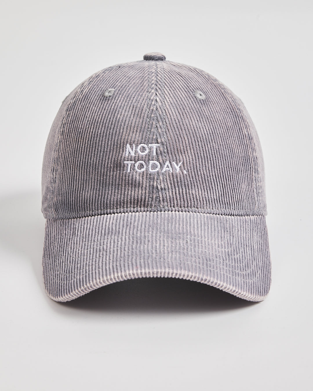 Gray corduroy cap with 'Not Today' text on a light gray background
