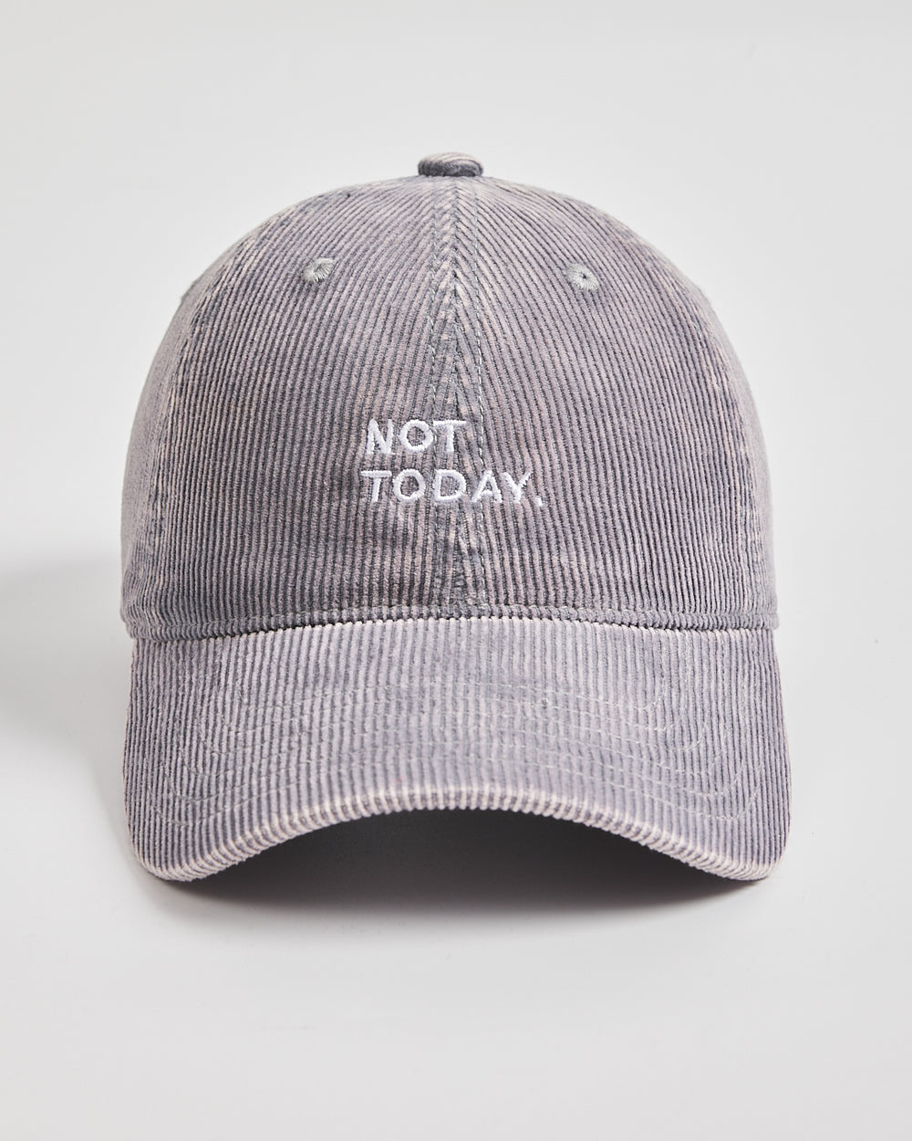 Gray corduroy cap with 'Not Today' text on a light gray background