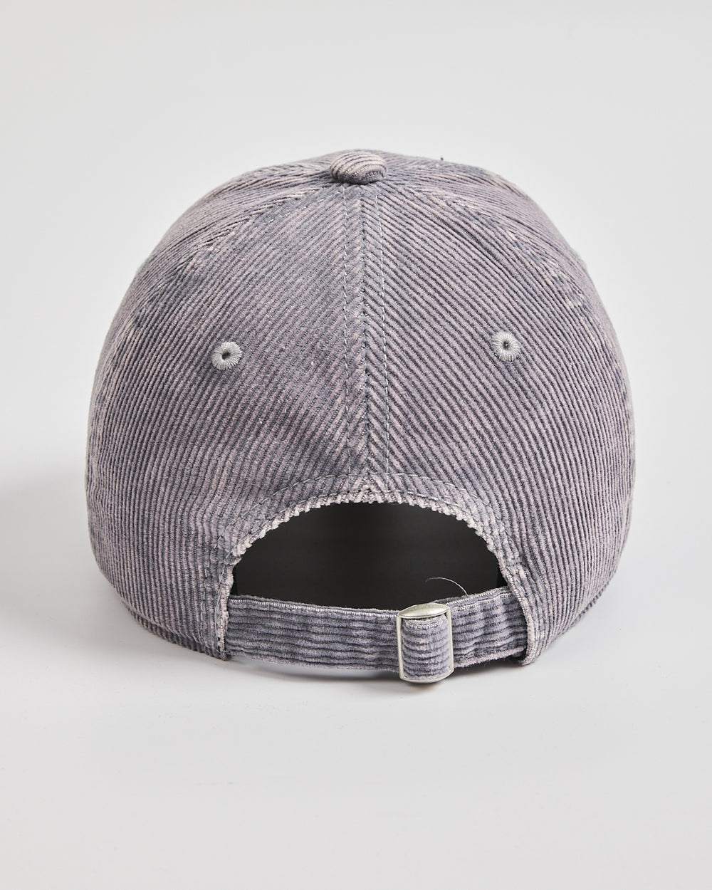 Gray corduroy cap on a light gray background