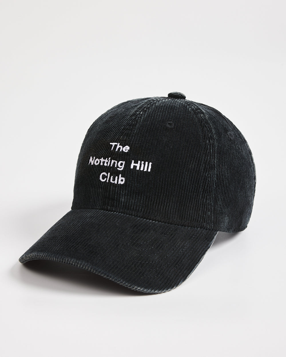 Black cap with 'The Notting Hill Club' text on a white background