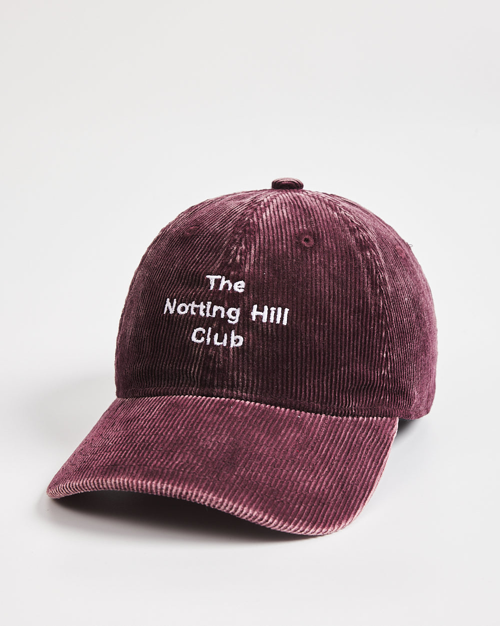 Maroon cap with 'The Notting Hill Club' text on a light gray background