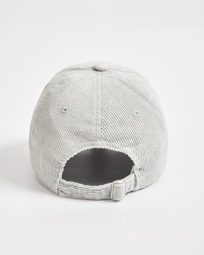 Gray corduroy cap on a white background