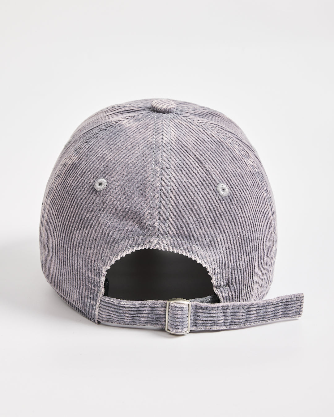 Gray corduroy cap on a white background