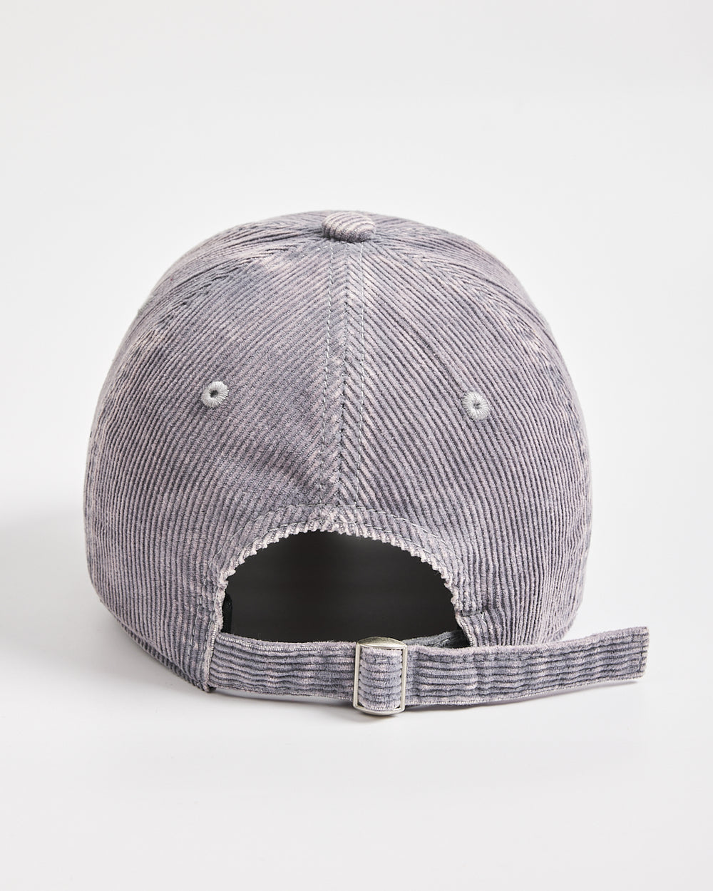 Gray corduroy cap on a white background