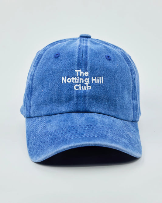 Front view of The Notting Hill Club Blue Washed Cap