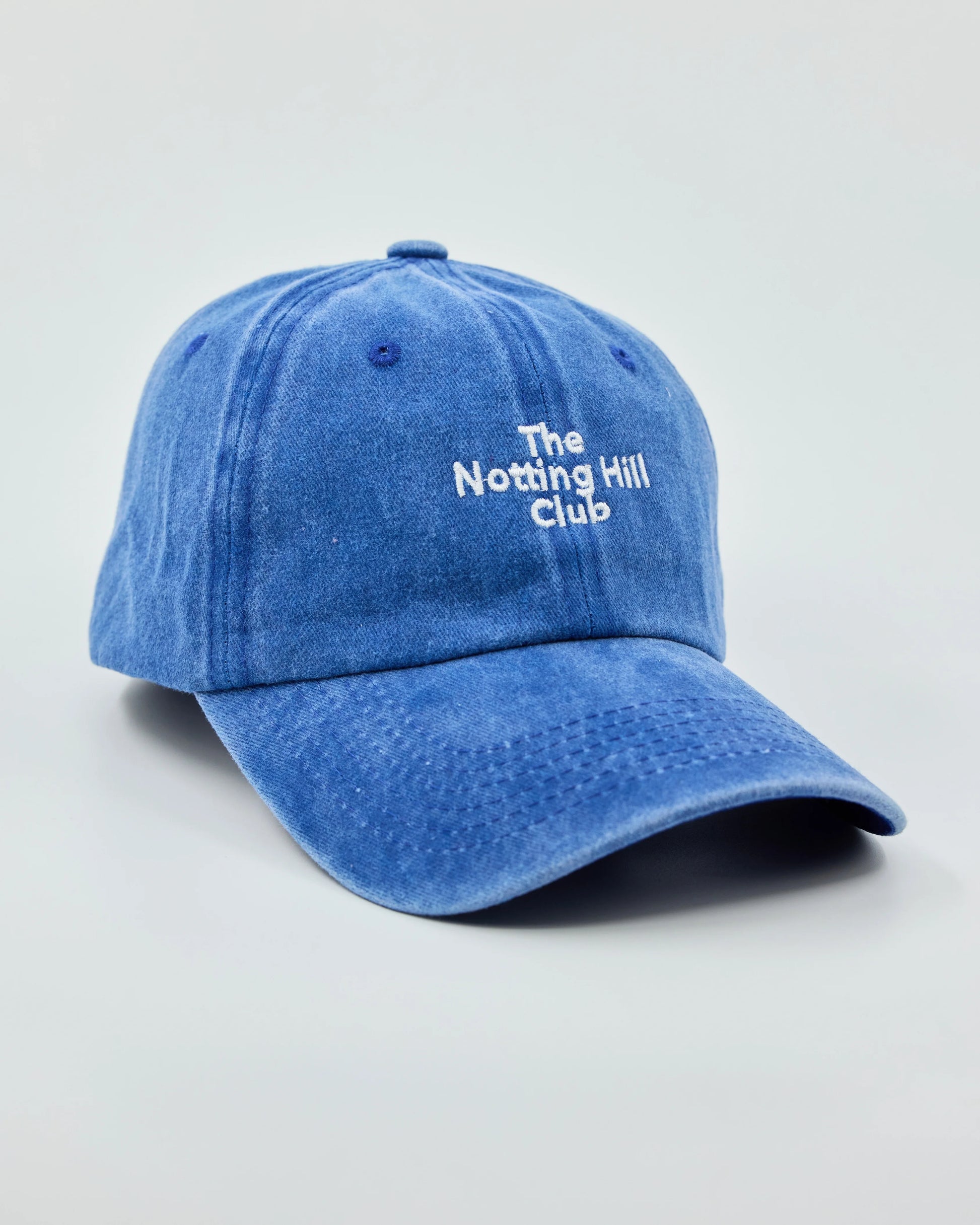 Side view of The Notting Hill Club Blue Washed Cap