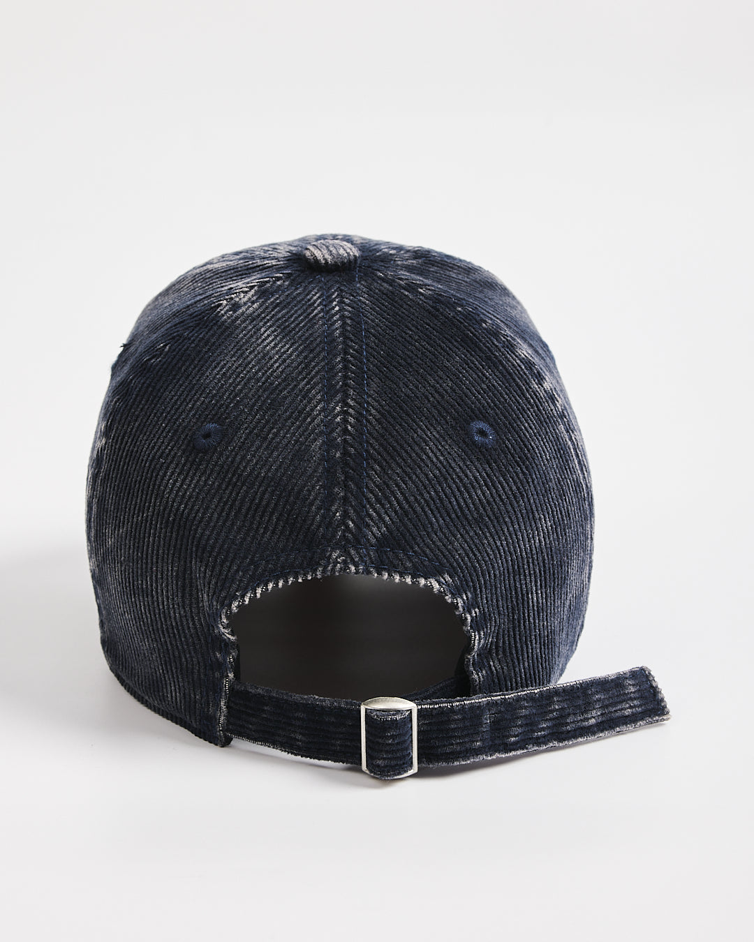 Navy distressed baseball cap on a white background