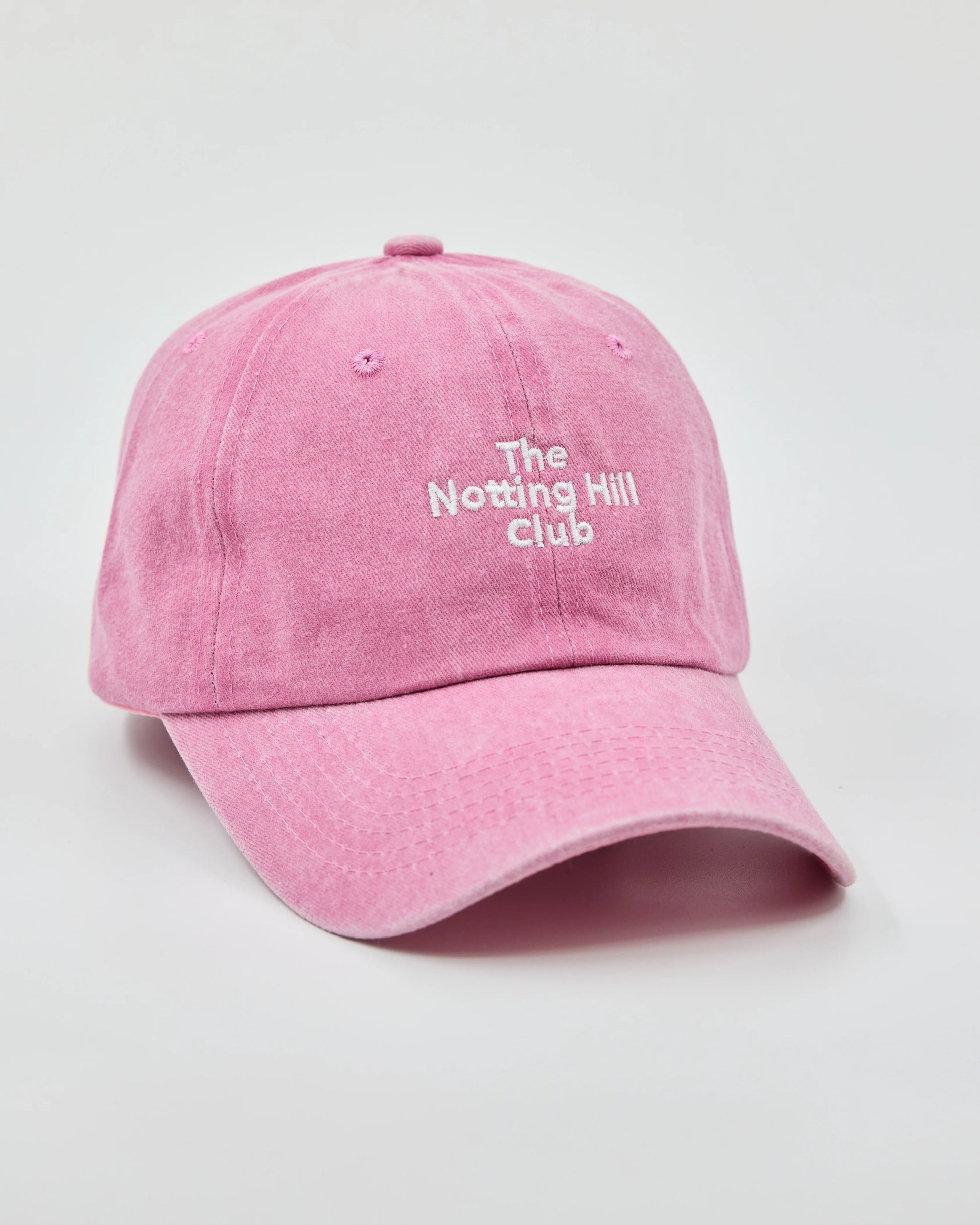 Side view of The Notting Hill Club Pink Washed Cap