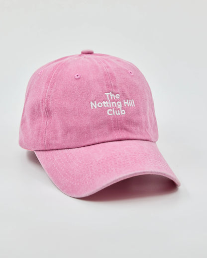Side view of The Notting Hill Club Pink Washed Cap