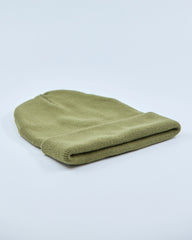 Olive beanie on a light gray background