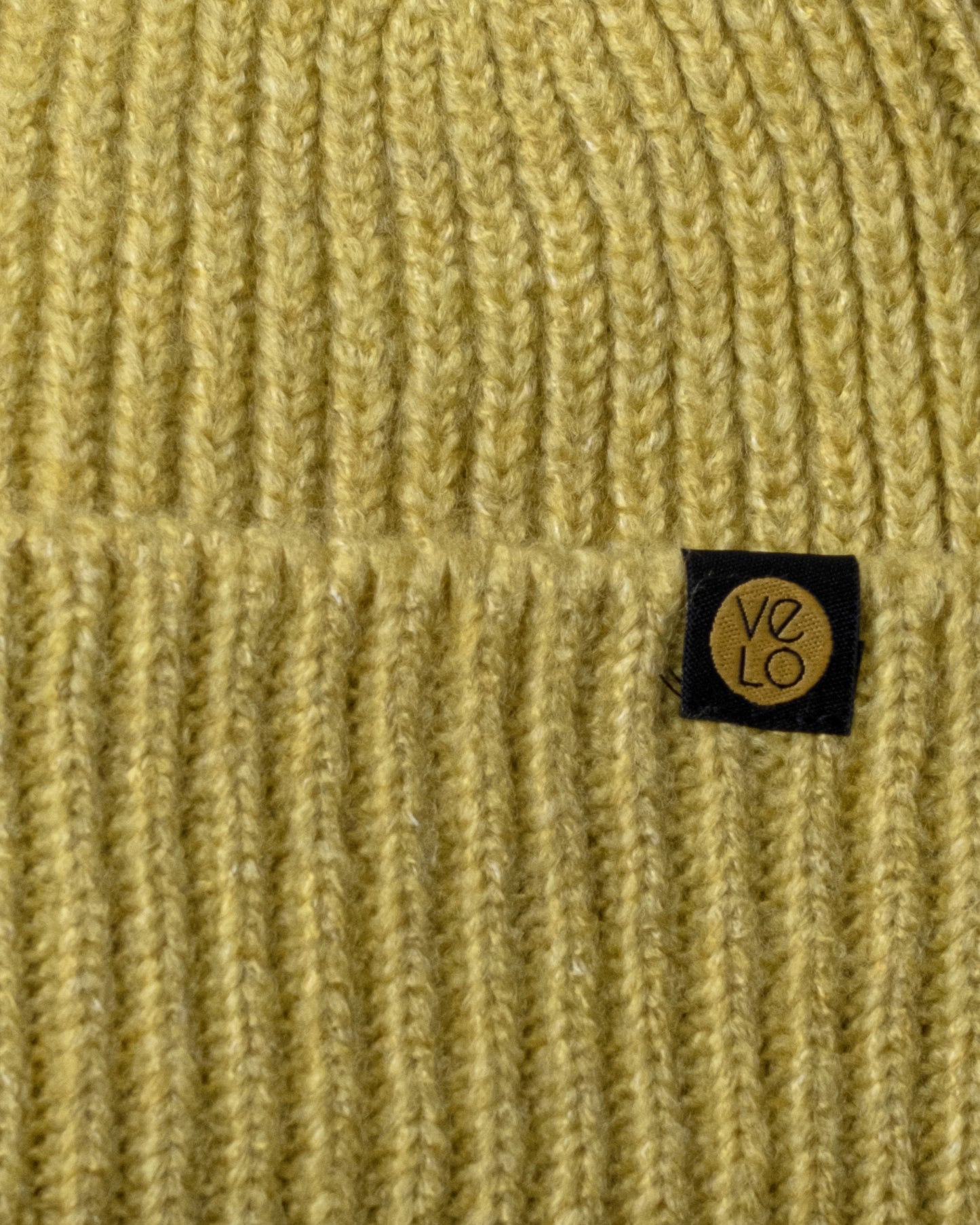 Close view of Olive Yellow Lux Beanie
