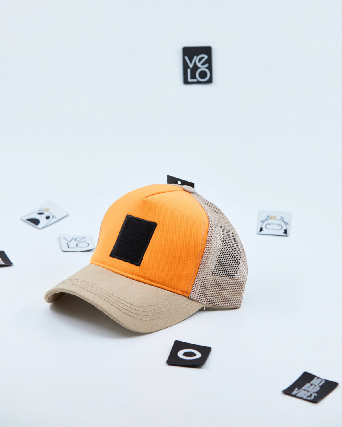 Side view of Orange and Beige Customisable Trucker Cap without patches