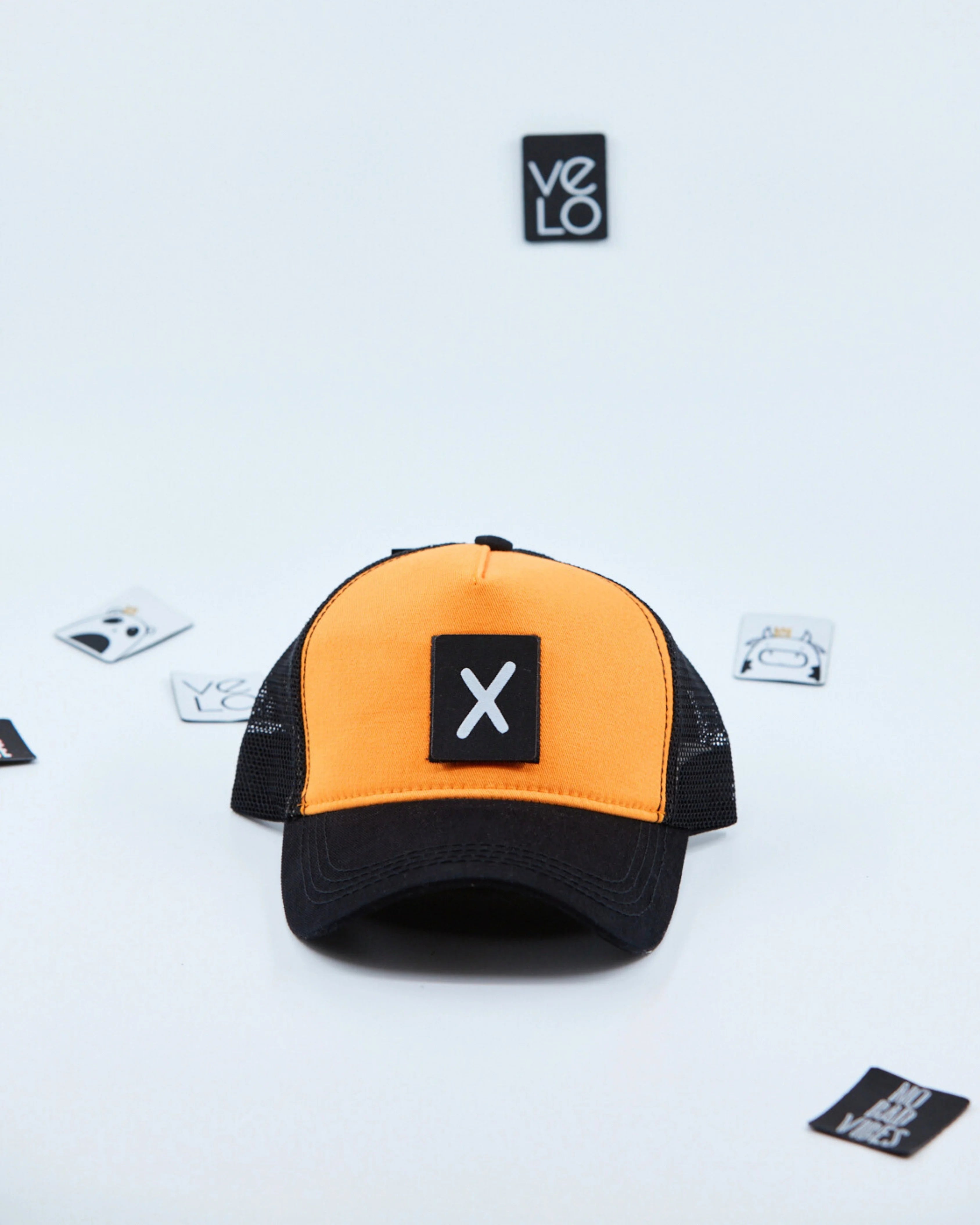 Front view of Orange and Black Customisable Trucker Cap