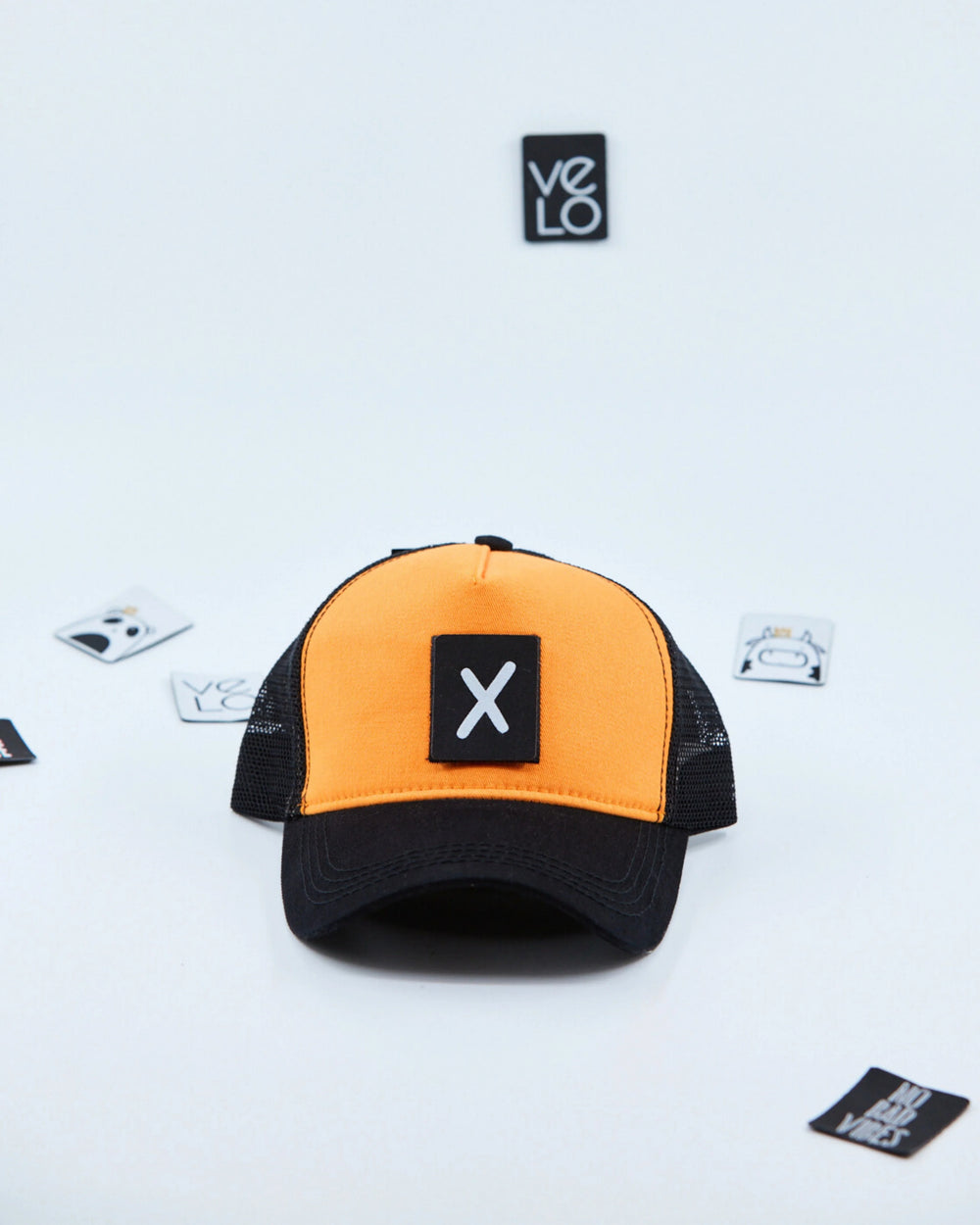 Front view of Orange and Black Customisable Trucker Cap