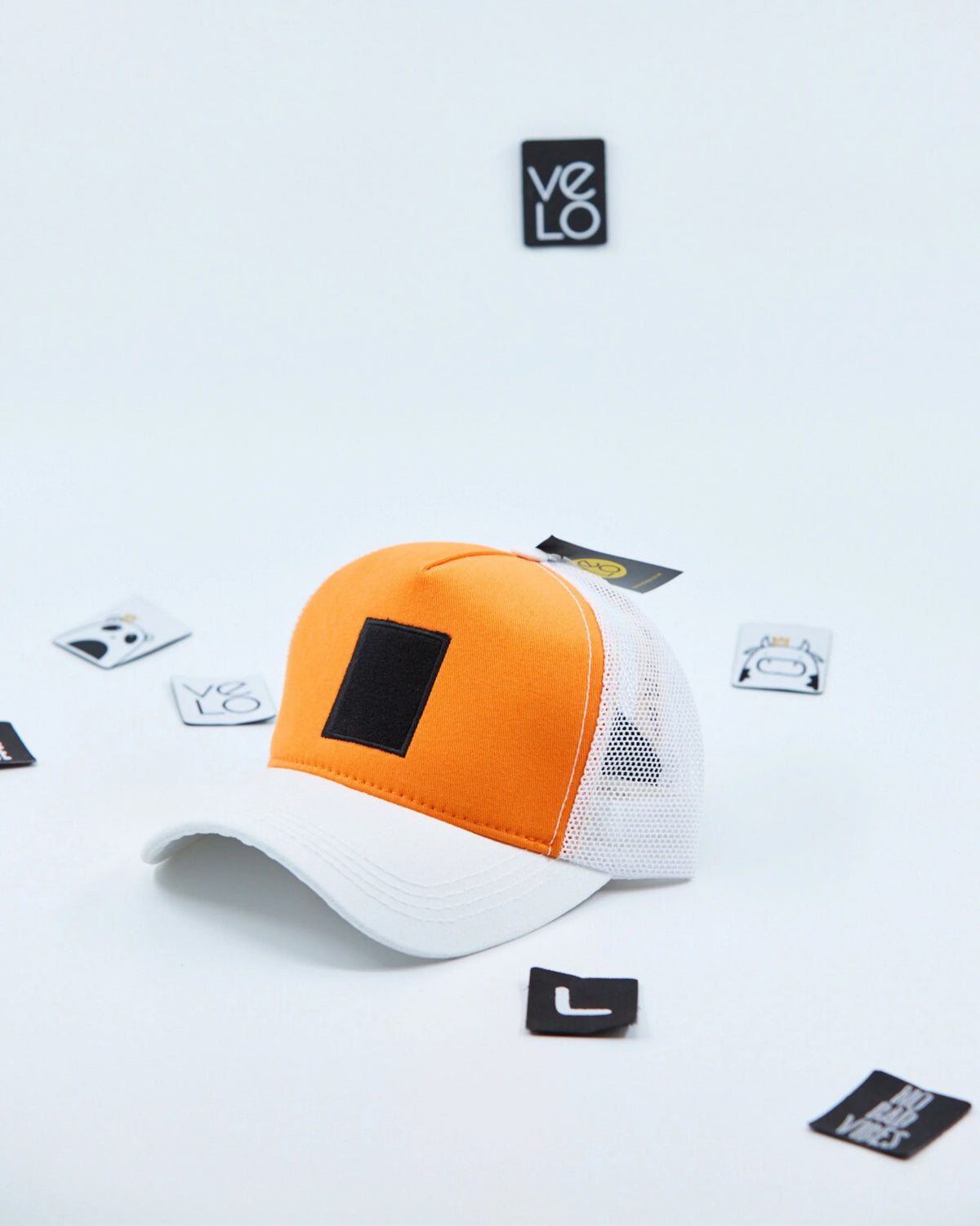 Side view of Orange and White Customisable Trucker Cap