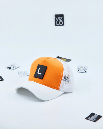 Side view of Orange and White Customisable Trucker Cap with patches